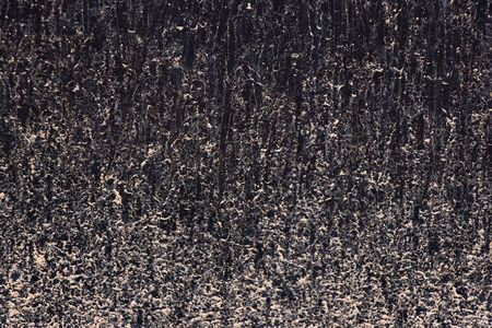 White color stain on black background