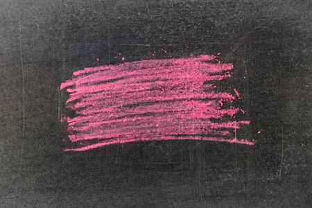 Grunge pink chalk art brush in square line shape on black board background. Decoration and design elementの写真素材