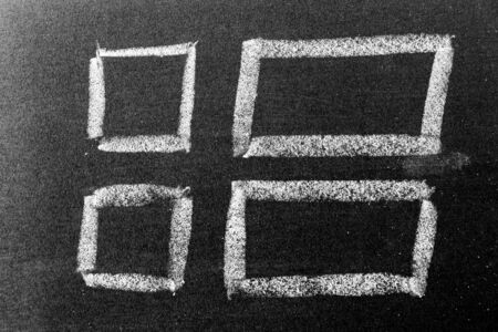 White chalk hand drawing in square or banner shape on black board background