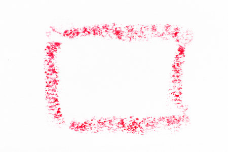 Red color oil pastel drawing in rectangle or square shape on white paper backgroundの写真素材