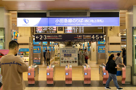 Tokyo, Japan - May 4 2019 : Unidentified people walk in front of Odakyu line entrance at Shinjuku station. This line can lead to Hakone that is the famous travel destination.のeditorial素材