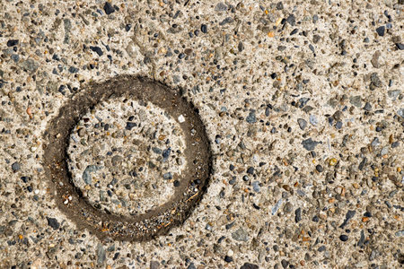 Stone concret floor with round groove textured backgroundの写真素材
