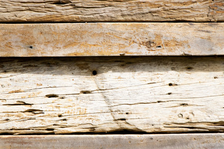 Grunge old brown wood plate textured background for decorationの写真素材