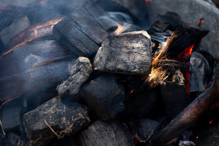 Black coal that have fire and smoke backgroundの写真素材