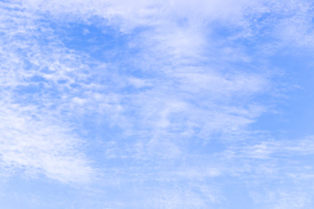 Clear blue color sky with white cloud backgroundの写真素材