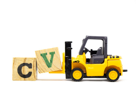 Toy forklift hold letter block V to complete word CV (Abbreviation of curriculum vitae) on wood...