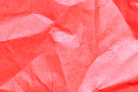 Grunge wrinkled red color paper textured background