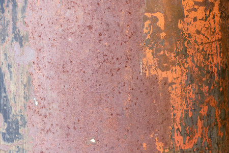Grunge red and brown color rust metal sheet backgroundの写真素材