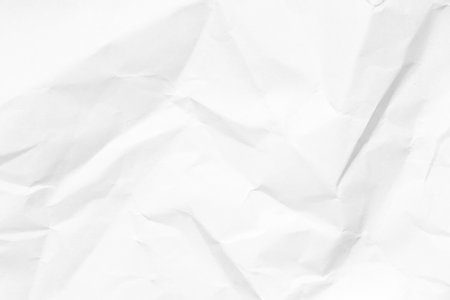 Grunge wrinkled white color paper textured background with copy spaceの写真素材