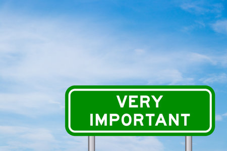 Green color transportation sign on blue sky with white cloud backgroundの写真素材