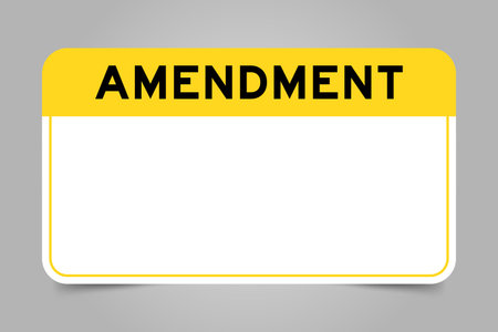 Label banner that have yellow headline with word amendment and white copy space, on gray backgroundのイラスト素材