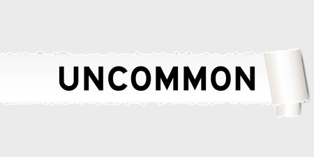 Ripped gray paper background that have word uncommon under torn partのイラスト素材