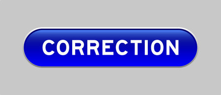 Blue color capsule shape button with word correction on gray background
