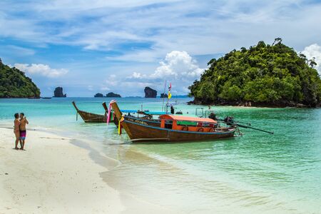 KRABI , THAILAND - AUGUST 25, 2014: Separated sea famous attractions.Tourist s of different countries come to visit the beautiful islands of Andaman and popular sunbathing on August 25, 2014 in Krabi.のeditorial素材
