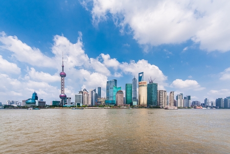 SHANGHAI-JUNE 2, 2012. Huangpu River and Pudong district seen from Bund. The Pudong district houses...