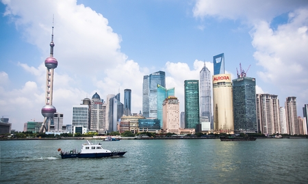 SHANGHAI-JUNE 2, 2012. Huangpu River and Pudong district seen from Bund. The Pudong district houses Lujiazui Finance and Trade Zone and the Shanghai Stock Exchange, it is Chinaのeditorial素材
