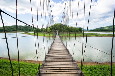 Suspension bridge above the lake path way to forest. Kaeng Krachan national park Phetchaburi Thailand.の写真素材