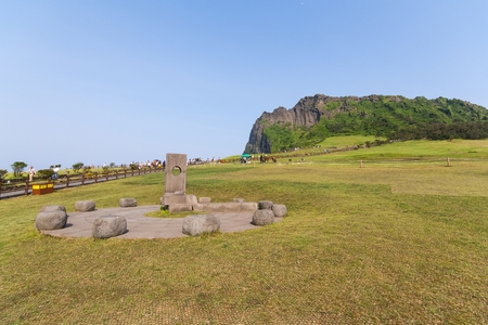 JEJU ISLAND, KOREA - MAY 29, 2012: Seongsan Ilchulbong Peak rose from under the sea in a volcanic eruption over 100,000 years ago.のeditorial素材