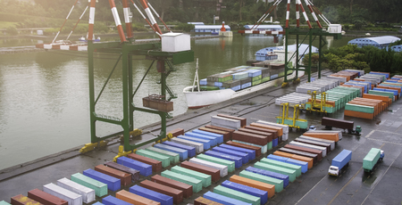 crane working with container cargo in shipyard