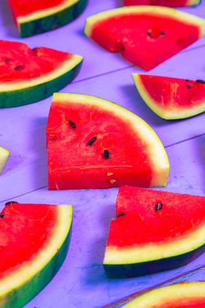 Watermelon on wood background