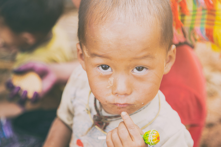 MUCANGCHAI, VIETNAM, MAY 24 , 2017: The Farmers can not be Identified from the terraced rice fields harvest .Mu Cang Chai is a district of Yen Bai province, in the northeastern region of Vietnam.のeditorial素材