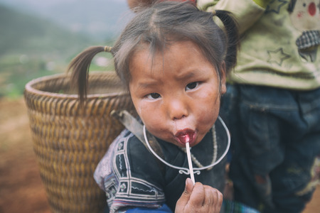 MUCANGCHAI, VIETNAM, MAY 24 , 2017: The Farmers can not be Identified from the terraced rice fields harvest .Mu Cang Chai is a district of Yen Bai province, in the northeastern region of Vietnam.のeditorial素材
