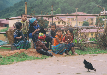 MUCANGCHAI, VIETNAM, MAY 24 , 2017: The Farmers can not be Identified from the terraced rice fields harvest .Mu Cang Chai is a district of Yen Bai province, in the northeastern region of Vietnam.のeditorial素材