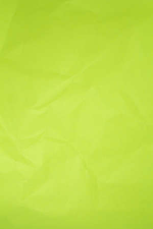 Crumpled green paper background.の写真素材