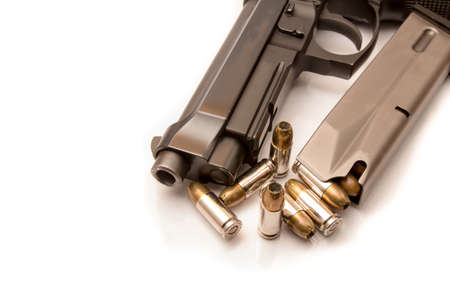 close-up on 9mm ammo with a handgun.