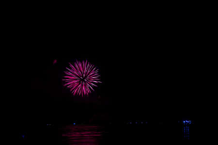 Abstract colored firework background with free space for textの写真素材