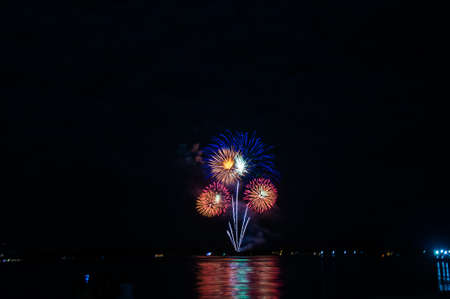 Abstract colored firework background with free space for textの写真素材