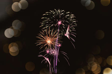 Abstract colored firework background with free space for textの写真素材