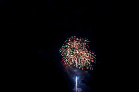 Abstract colored firework background with free space for textの写真素材