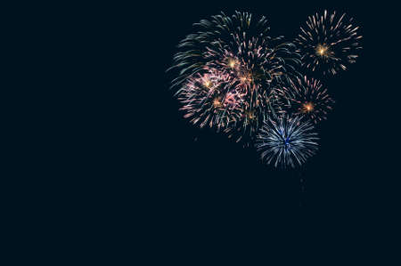 Abstract colored firework background with free space for textの写真素材