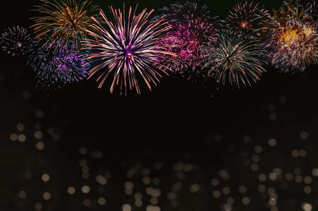 Abstract colored firework background with free space for textの写真素材