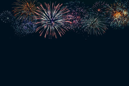 Abstract colored firework background with free space for textの写真素材