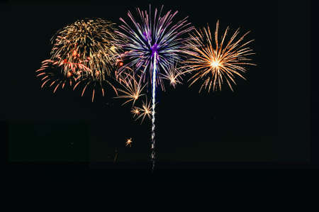 Abstract colored firework background with free space for textの写真素材