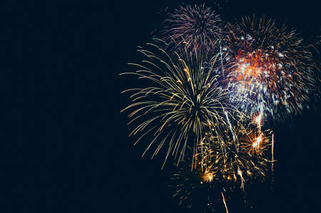 Abstract colored firework background with free space for textの写真素材