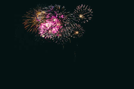 Abstract colored firework background with free space for textの写真素材