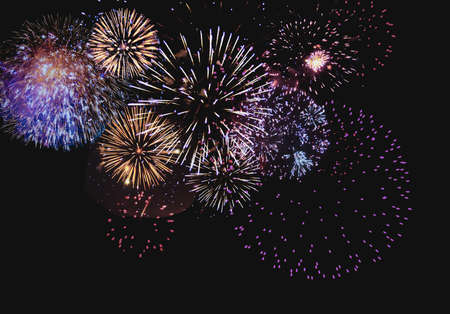 Abstract colored firework background with free space for textの写真素材