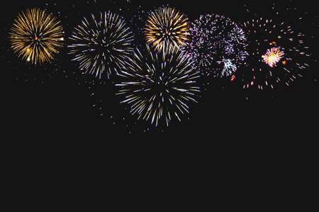 Abstract colored firework background with free space for textの写真素材