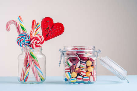 Candies and lollipops in jarsの写真素材