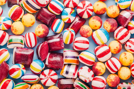 Candies on blue backgroundの写真素材