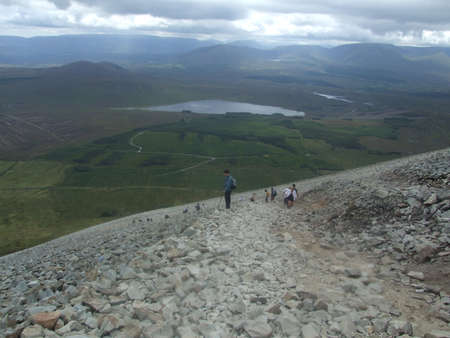 Pilgrims climbing Croagh Patrick mountain sacred to St. Patrick in county Mayo, Irelandの写真素材