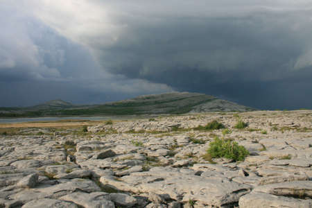 Thunderstorm building over Mullaghmore mountain in the Burren county Clare Irelandの写真素材