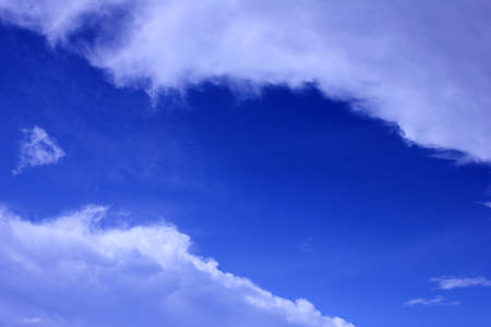 Blue sky with cloudsの写真素材