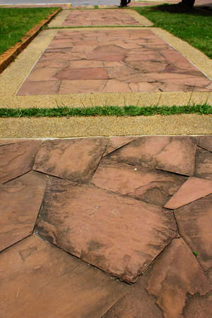 stone way in green grass  の写真素材