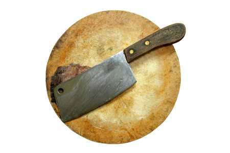 large old chef's knife on chopping block の写真素材