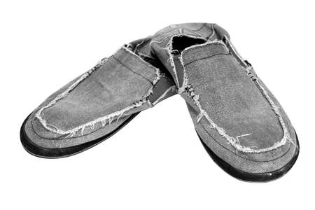 An old worn pair of shoes. の写真素材