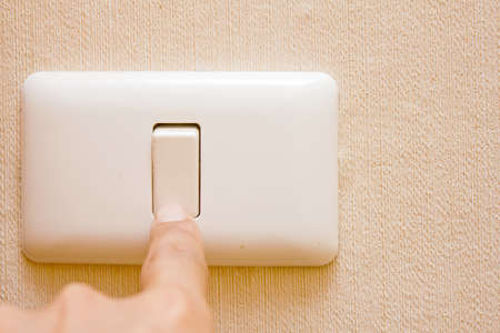 Finger turning white light switch on or off 